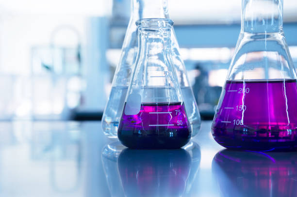 istock chemical purple water solution in glass flask at education science laboratory background 1144275938