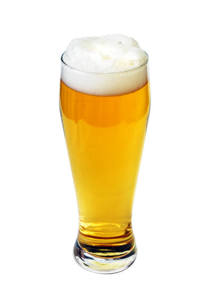 Pint glass beer high angle view isolated with clipping path. Focus on bubbles