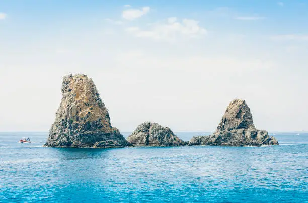 Acitrezza rocks of the Cyclops, sea stacks in Catania, Sicily, Italy