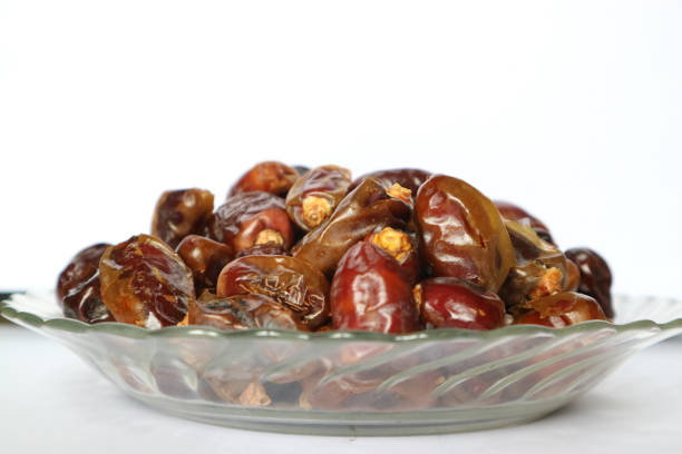 istock bowl of dried dates fruits 1144280743