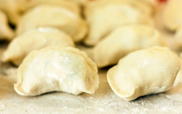 istock Preparing, cooking, making homemade dumplings with cabbage 1144281014