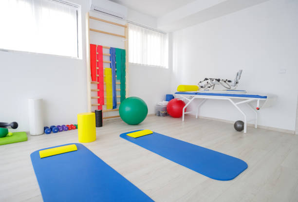 istock Kinesitherapy room with equipment and exercise machine 1144285216