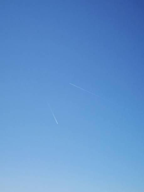istock Clouds and Sky Sunny Day Aircraft Chemtrail 1144285813