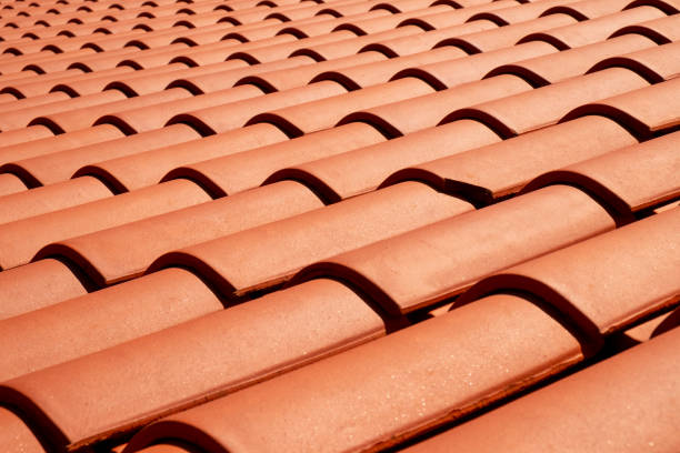 Roof tiles close-up Terracotta colored roof tiles close-up roof tile photos stock pictures, royalty-free photos & images