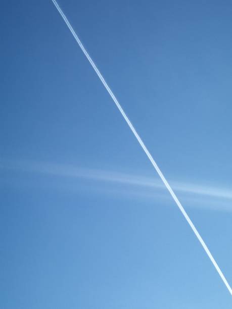 istock Clouds and Sky Sunny Day Aircraft Chemtrail 1144286153