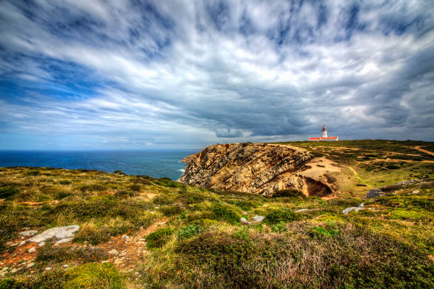 istock Dramatic Cliffs and Lighthouse at Cabo Espichel, Portugal 1144287559