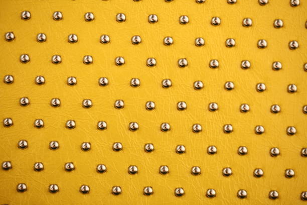 istock Fashionable women's yellow bag with iron rivets 1144289109