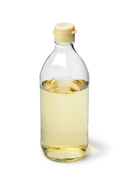 Bottle with traditional Japanese rice vinegarisolated on white background
