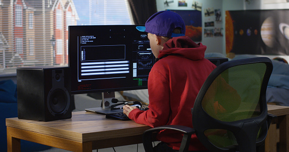 Programmer Boy Coding On His Computer Stock Photo - Download Image Now ...