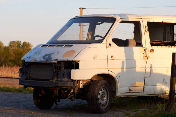 istock Standing old wreck car with rusty metal plates. Immobilized by the road. 1144294563
