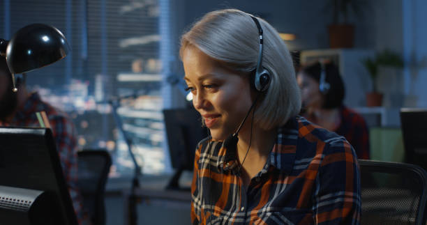 istock Young woman working in a call center 1144295770