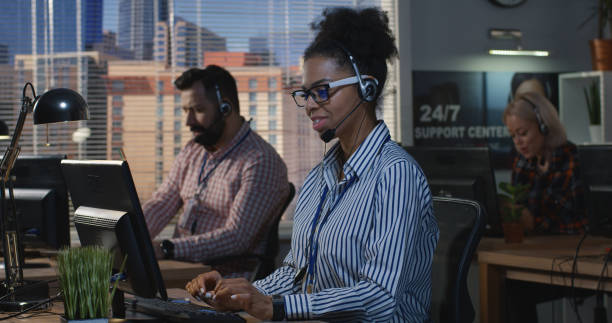 istock Woman working at his desk in a call center 1144295931
