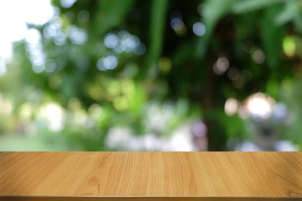 istock Empty dark wooden table in front of abstract blurred bokeh background of restaurant . can be used for display or montage your products.Mock up for space. 1144296461