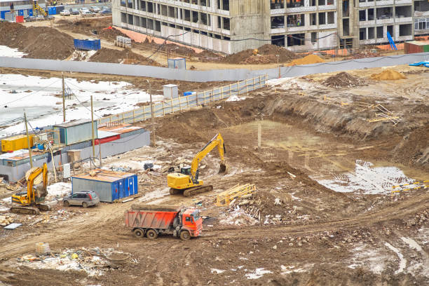 istock Construction site, machinery digs a boiler room for a new home 1144297177
