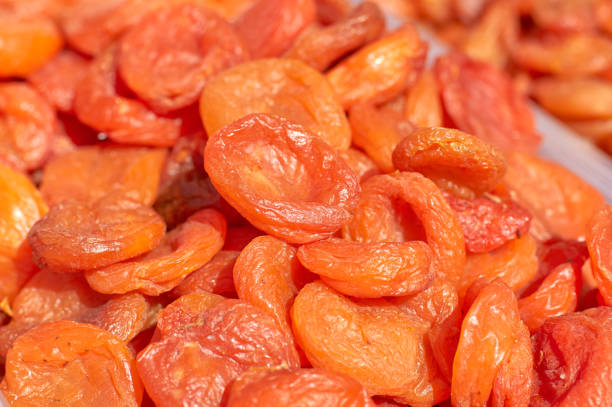 istock Dried apricots close-up, texture and background 1144297697