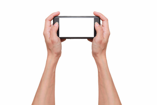 istock Cropped Hand Holding Smart Phone Against White Background 1144297792