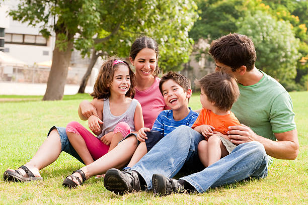 istock Happy family having fun in the park 114430108