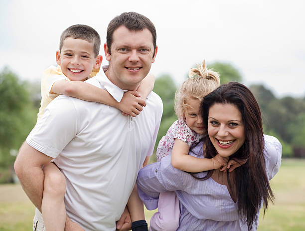 istock Smiling couple with kids 114430235