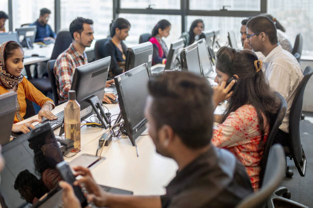 istock Male and female professionals working at office 1144302595