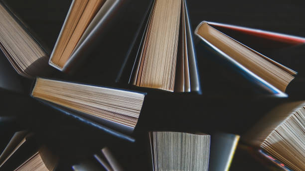 istock hardback books top view on wooden table 1144307679