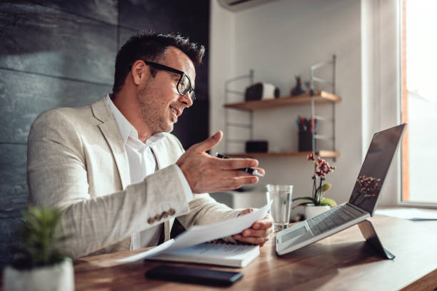 istock Businessman having online meeting in his office 1144310255