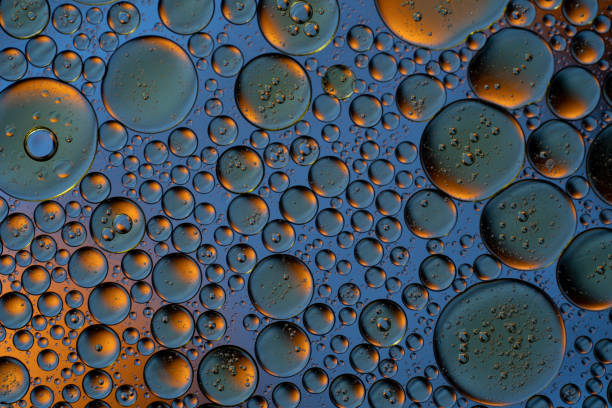 istock Bubbles world color full macro abstract in water surface background 1144311394