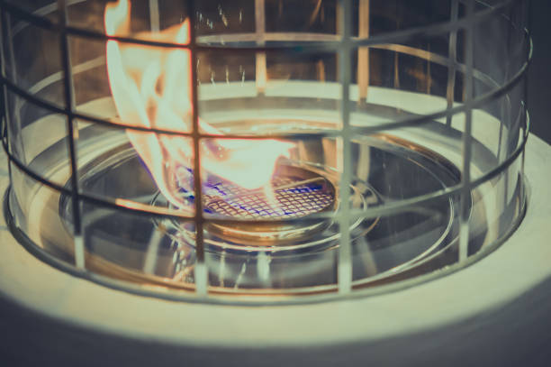 istock Modern bio fireplot fireplace on ethanol gas. Flame gas stove close-up. 1144311492