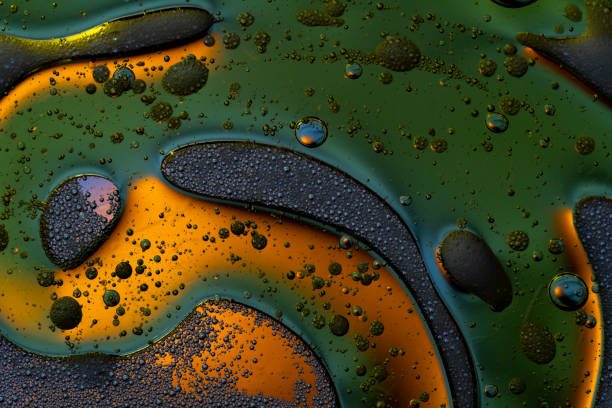 istock Bubbles world color full macro abstract in water surface background 1144311632