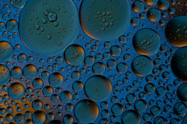 istock Bubbles world color full macro abstract in water surface background 1144311813