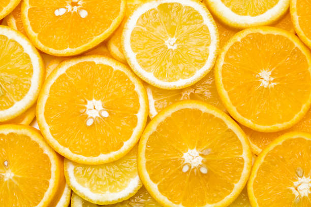 istock Background of sliced oranges and lemons 1144311829