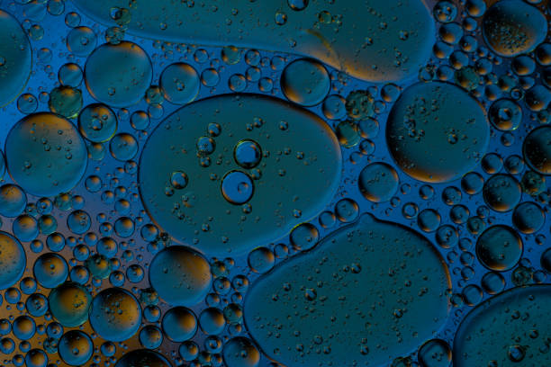 istock Bubbles world color full macro abstract in water surface background 1144313034