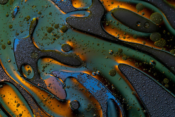 istock Bubbles world color full macro abstract in water surface background 1144313078