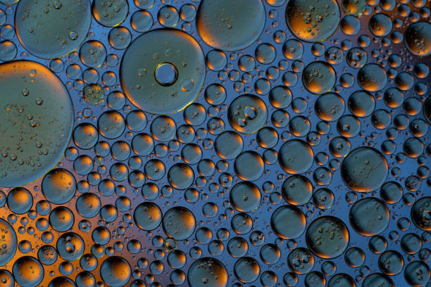 istock Bubbles world color full macro abstract in water surface background 1144313126