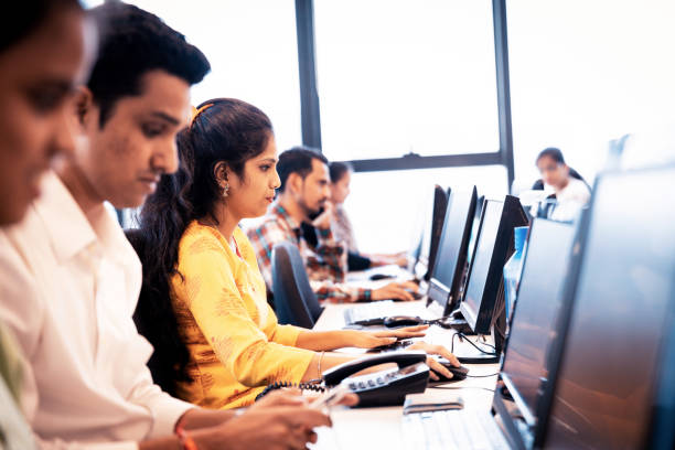 istock Group of Call Center Executives Working During their Shift 1144313163