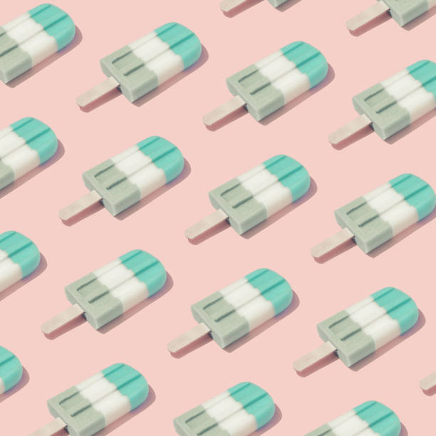 istock Colorful Ice cream popsicle pattern on pastel pink background. 1144313517