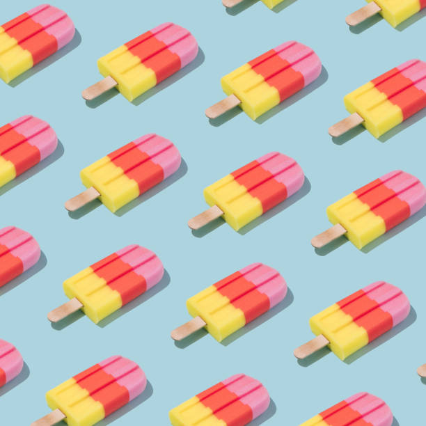 istock Colorful Ice cream popsicle pattern on pastel blue background. 1144313751
