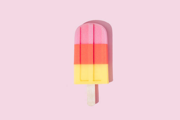 istock Colorful Ice cream popsicle on pastel pink background. 1144314002