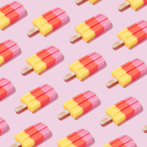 istock Colorful Ice cream popsicle pattern on pastel pink background. 1144315758