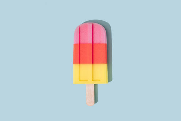 istock Colorful Ice cream popsicle on pastel blue background. 1144316269