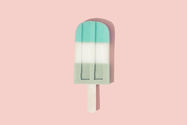 istock Colorful Ice cream popsicle on pastel pink background. 1144316891