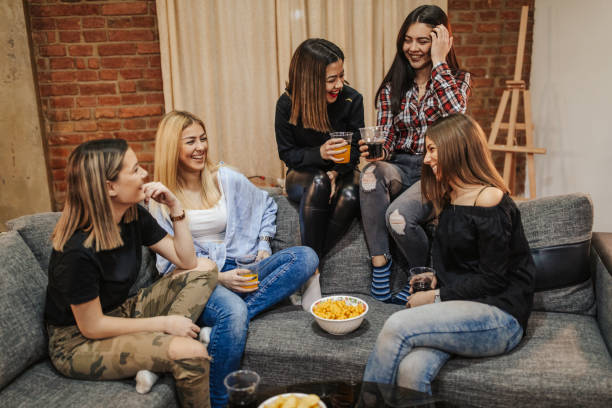 istock Friends having fun at home 1144318792