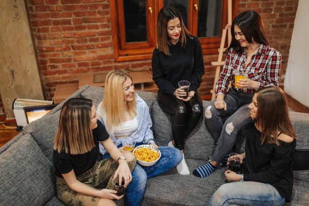istock Friends having fun at home 1144318985