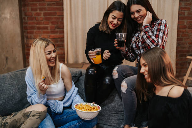 istock Friends having fun at home 1144319218