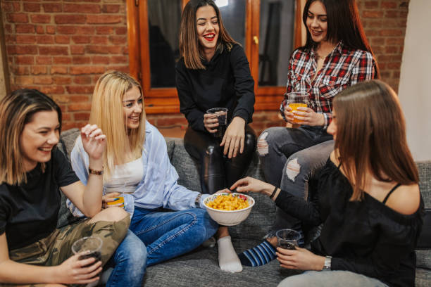 istock Friends having fun at home 1144319373