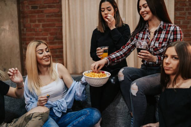 istock Friends having fun at home 1144319454