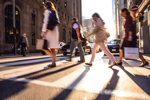 Crosswalk, people crossing in downtown