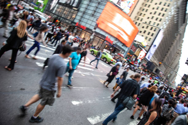istock Crosswalk, people crossing in downtown 1144320560