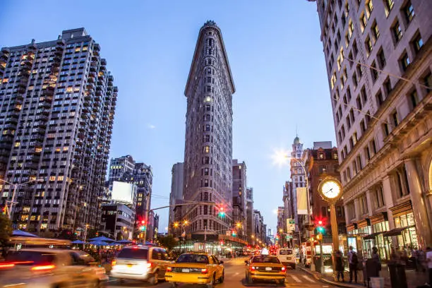 Photo of Flatiron building in Midtown New York at dusk