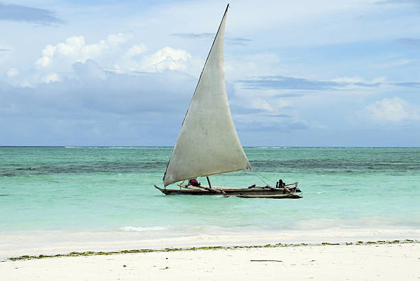 istock Fishermen relaxing on their dhow, Zanzibar 114432143
