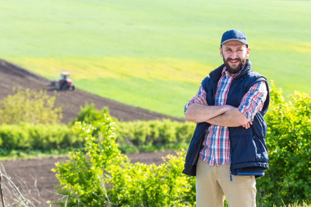 istock Farmer standing with arms crossed 1144322372